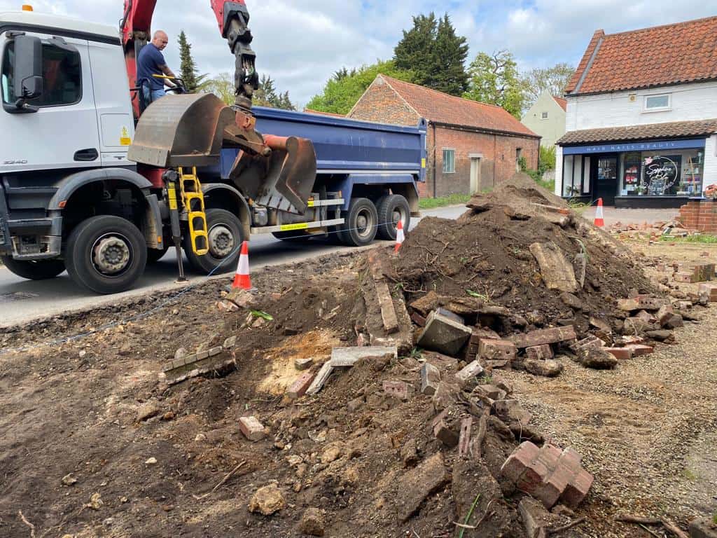 This is a photo of a dig out being carried out for the installation of a new tarmac driveway. Works being carried out by Eastbourne Driveways