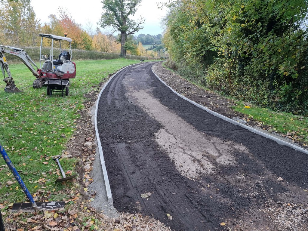 This is a large driveway which is in the process of having a tar and chip driveway installed on by Eastbourne Driveways