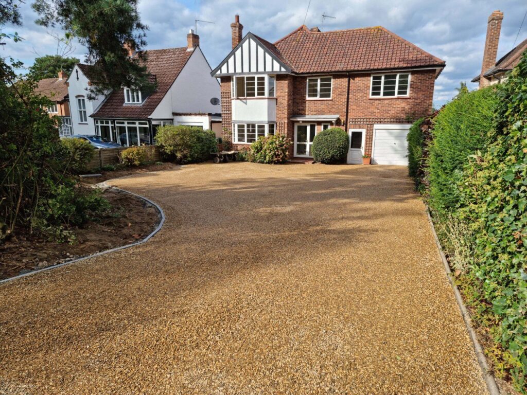 This is a newly installed tar and chip driveway installed by Eastbourne Driveways